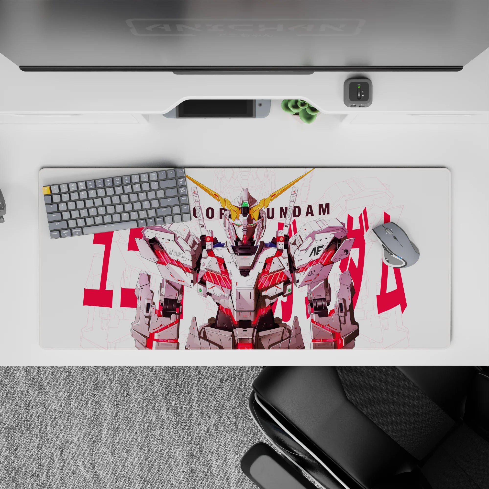 White and gray mecha desk pad 36x16 inches with neon red psycho-frame lines and a gold V-fin.