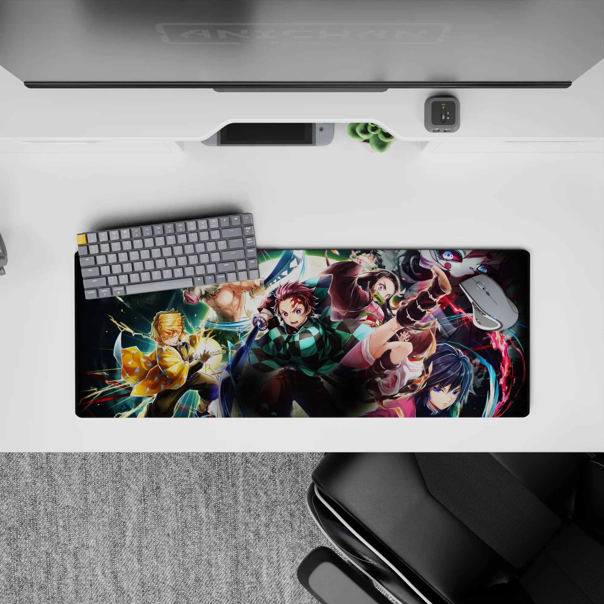 Demon Slayer anime mouse pad, 32x12 inches, featuring Tanjiro, Nezuko, Zenitsu, Inosuke, and Giyu in an epic battle scene.