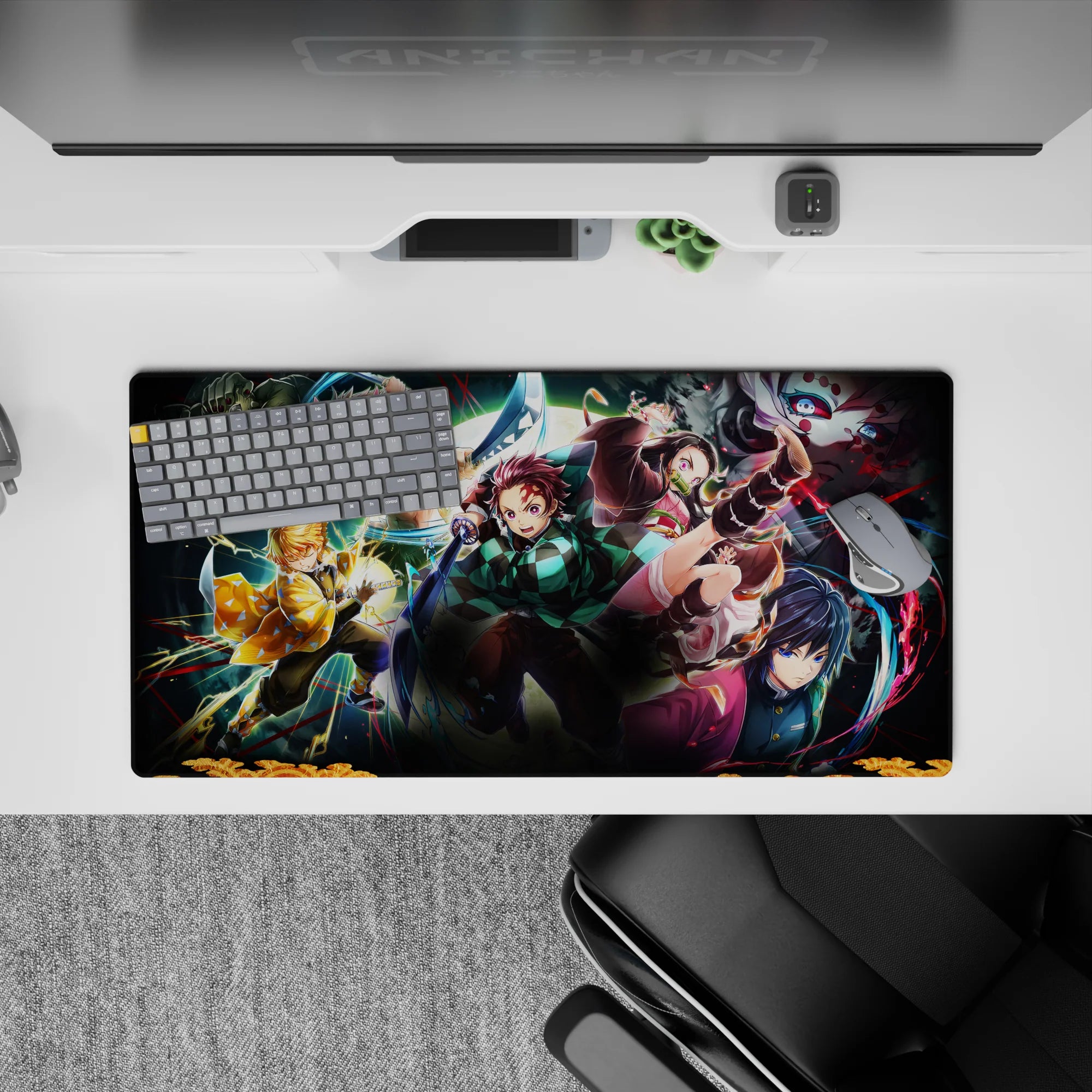Demon Slayer anime mouse pad 32x16 inches featuring Tanjiro, Nezuko, Zenitsu, Inosuke, and Giyu in action-packed scene.