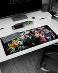 Demon Slayer desk pad 36x16 inches featuring Tanjiro, Nezuko, Zenitsu, Inosuke, Giyu in battle, vibrant colors, spider demon.