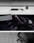 Midnight anime desk pad 36x16 inches in black, violet glow, crimson streaks, after-dark cyber mood.