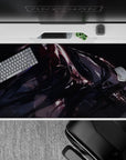 Midnight cyber vibe desk pad 40x20 inches in black, violet, and crimson with after-dark sparkles.