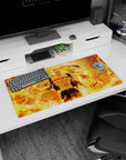 32x16 inches anime desk mat showing grinning fighter in ripped black cloth, holding a blazing fireball.