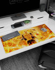 36x16 inches desk pad showing grinning ripped-cloth fighter holding a flaming orb with a curved blade behind.