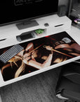 40x20 inches anime girl desk pad showing a relaxed assassin with twin daggers on a dark, cinematic backdrop.