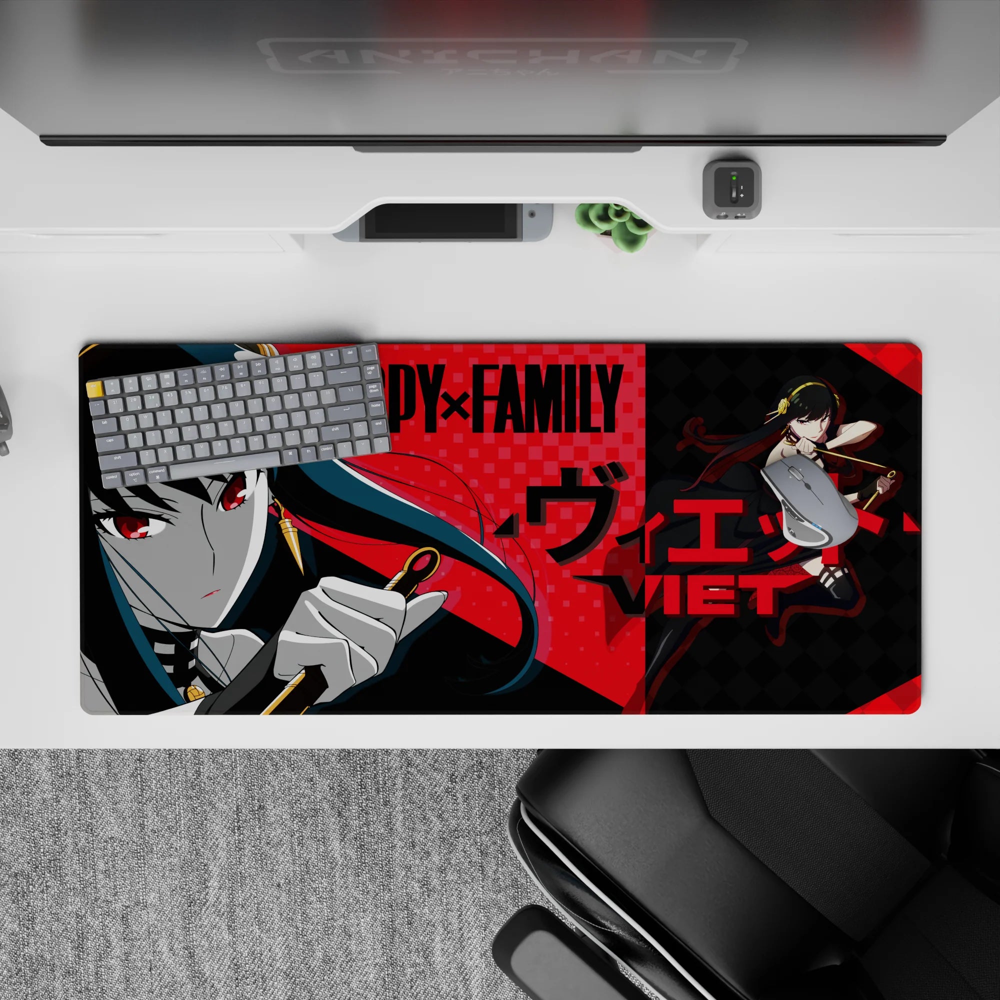 Anime desk pad 36x16 inches in crimson, teal-black, and red checker tones with calm, dangerous vibe.