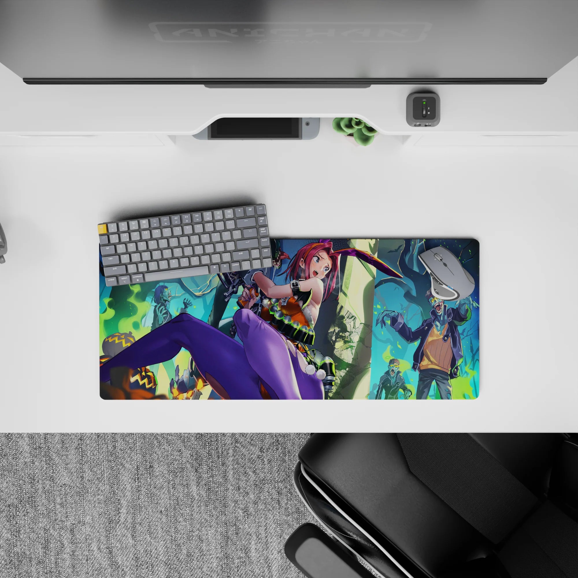 Neon pink, purple, teal Halloween anime mouse pad 28x12 inches with eerie smoke and spooky trees.