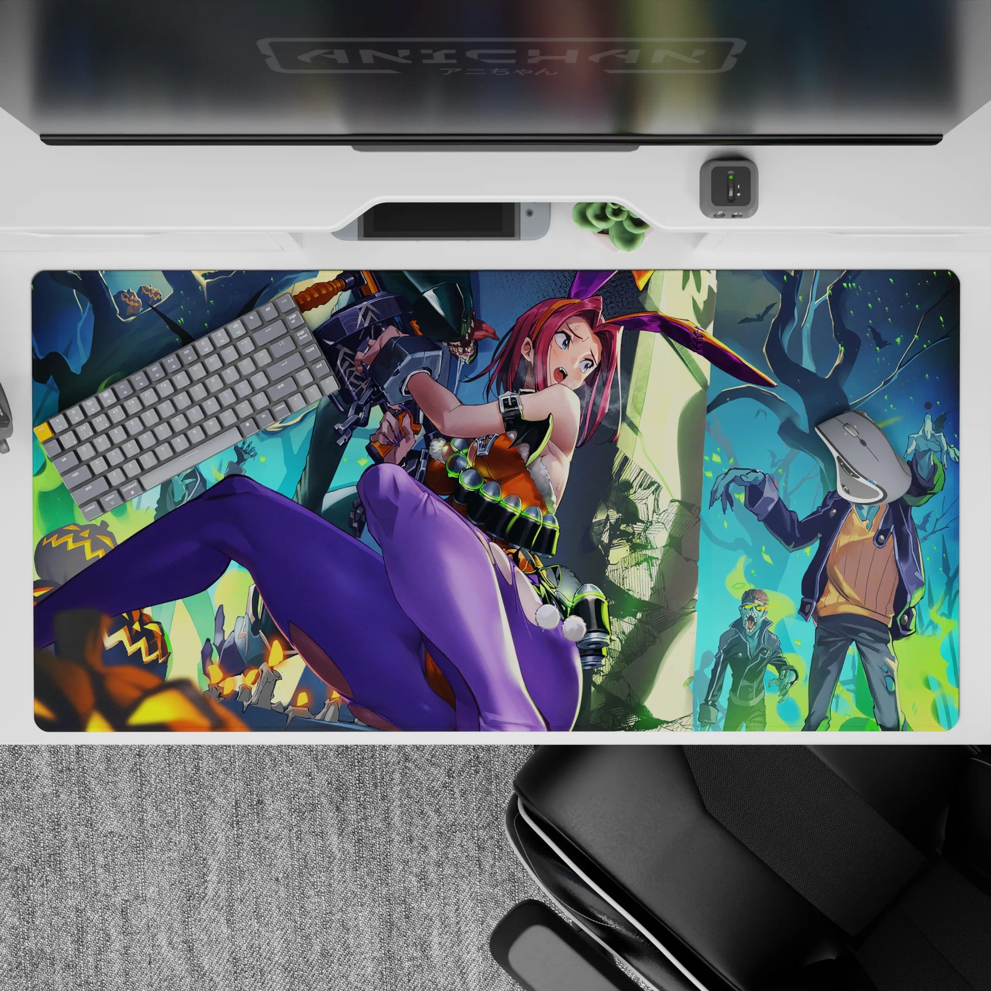 Neon Halloween mood desk pad 40x20 inches in pink, purple, orange and teal smoke with spooky forest.