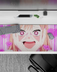 Sugar-pink kawaii desk pad 36x16 inches, bubbly rom-com vibe with neon hearts and glitter accents.
