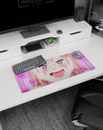 Happy anime girl with heart pupils and glitter nails screaming with joy on a 28x12 inches desk mouse pad.