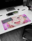 Happy anime girl with peach hair and heart pupils, glitter nails on cheeks, mouse pad 32x16 inches.