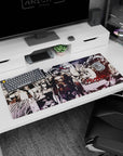 36x16 inches anime desk pad featuring Goblin Slayer in heavy plate armor, visor down, fur-trim collar.