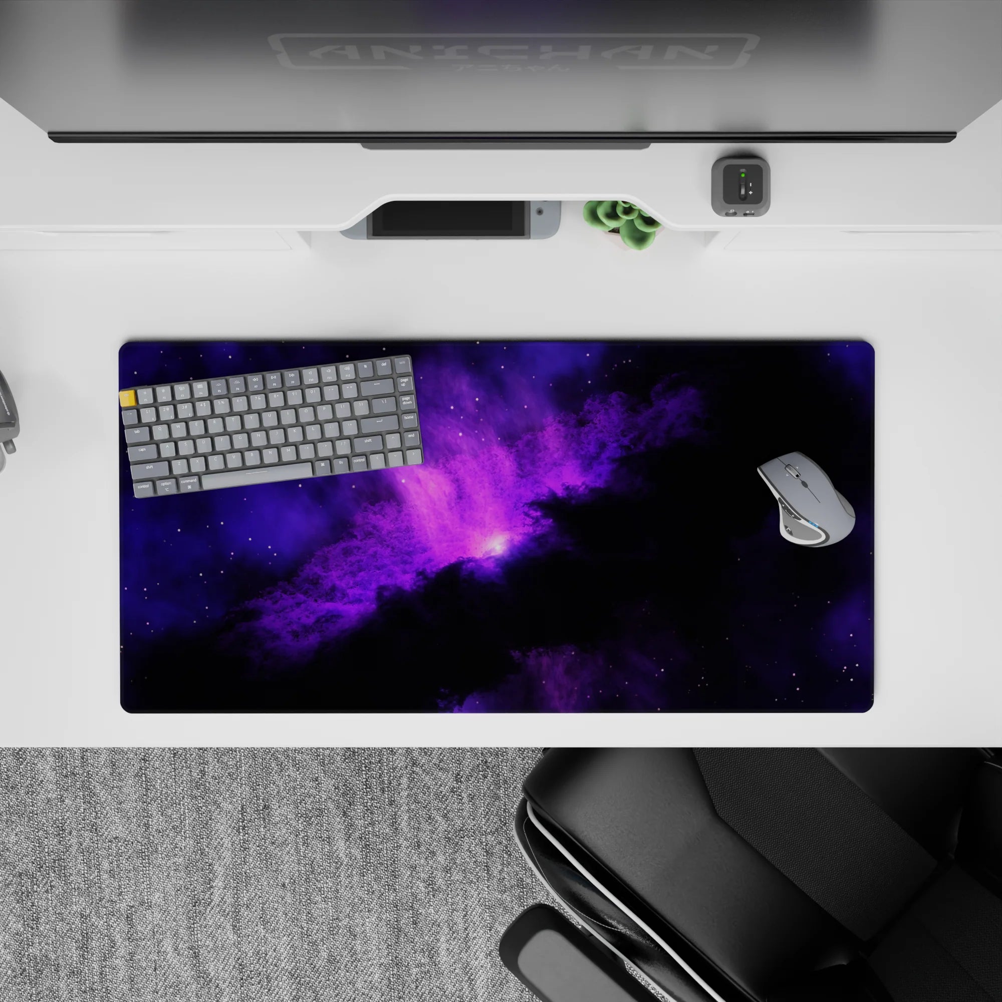 Moody purple glow on black mouse pad 32x16 inches, calming deep-space vibe for gaming.