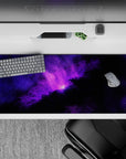 Cozy dreamy purple glow on inky black desk pad for gaming or work, 36x16 inches.