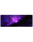 Galaxy nebula desk mouse pad 32x12 inches with star-speckled violet clouds on black.