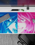 Electric blue and hot pink anime desk pad 40x20 inches, high-energy neon drama vibe with sweat-drop detail.