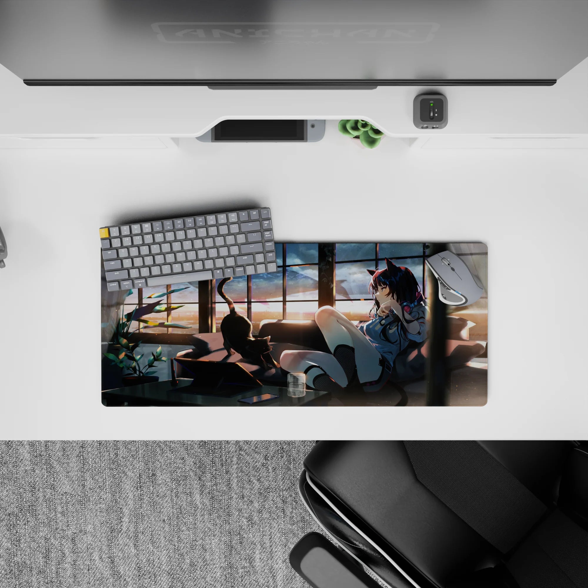 Cozy sunset anime girl mouse pad 28x12 inches in warm orange glow, smoky shadows, soft lens specks.