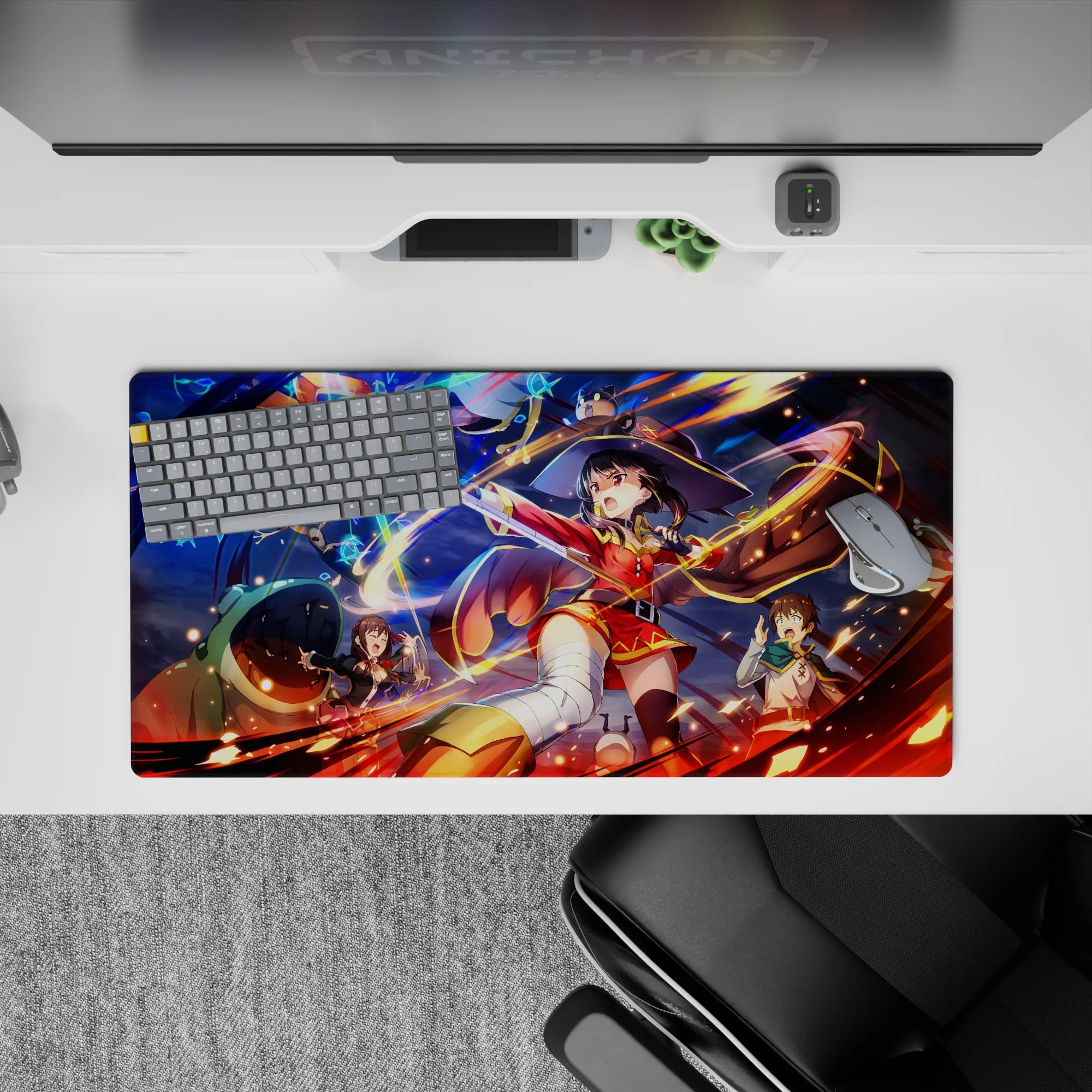 Megumin from Konosuba casting explosion amidst chaos on a 32x16 inches anime mouse pad with vibrant colors and dynamic scene.