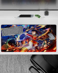 Megumin from Konosuba casting explosion amidst chaos on a 32x16 inches anime mouse pad with vibrant colors and dynamic scene.