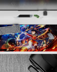 Megumin from Konosuba unleashing an explosion on a 36x16 inch anime mouse pad, featuring vibrant colors and dynamic action.