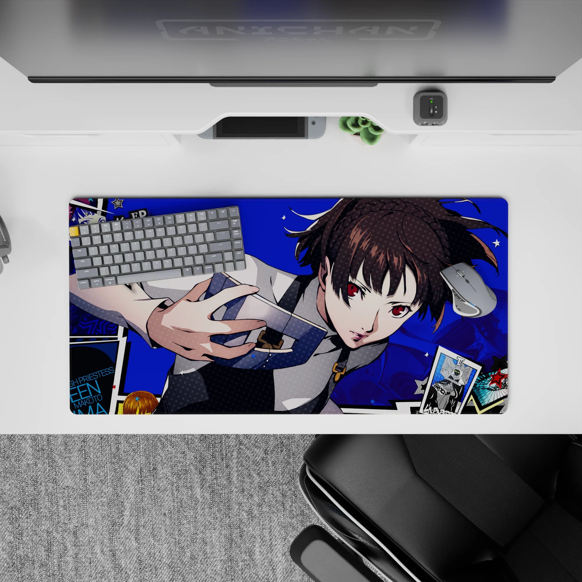 Makoto Niijima from Persona 5 on a 32x16 inch anime mouse pad, electric blue backdrop, with tarot cards floating around.