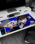 Makoto Niijima from Persona 5 on a 40x20 inch anime mouse pad with electric blue backdrop and tarot cards.