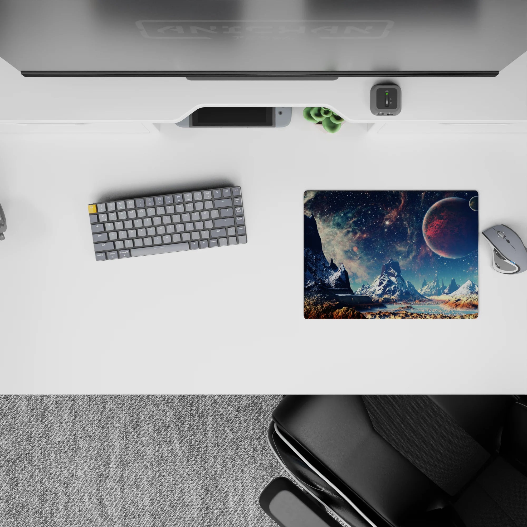 Moody 14x10 inches mouse pad in teal starlit haze with dark jagged peaks, warm sandy ground, and red planet.