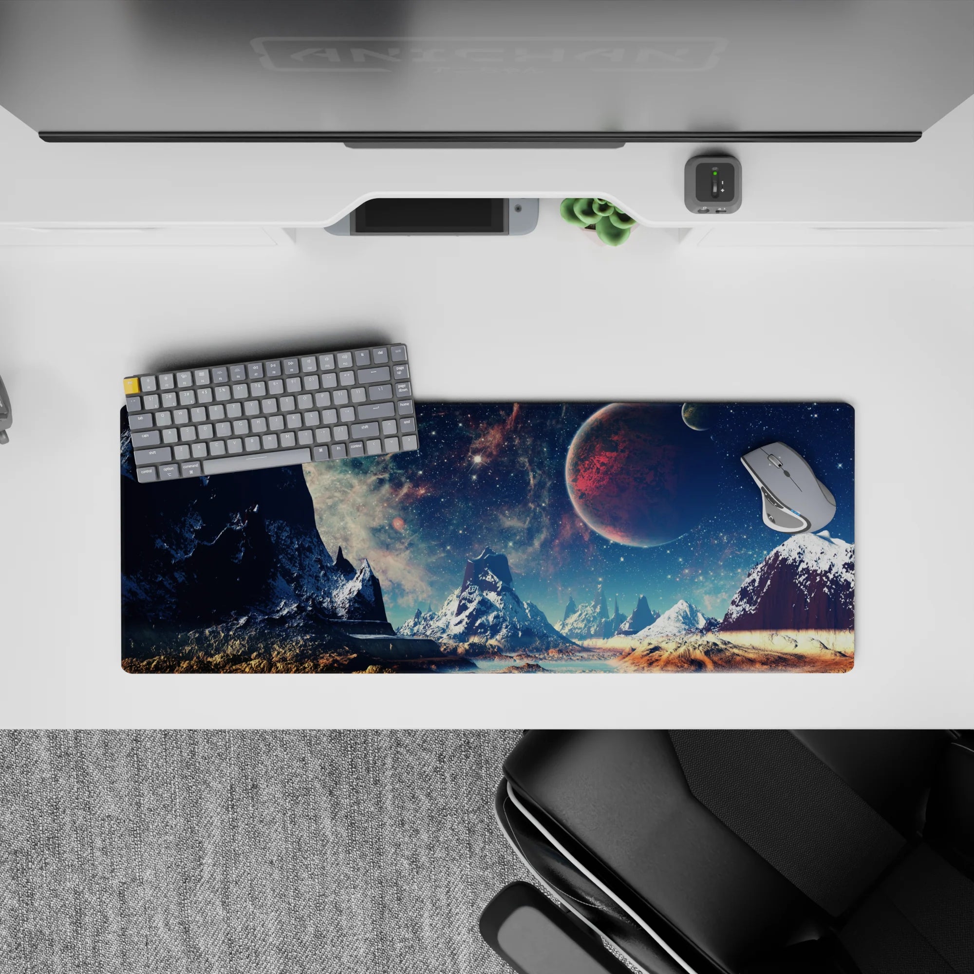 Moody midnight and teal starlit desk pad mouse pad 32x12 inches with frosty peaks and warm sandy ground.