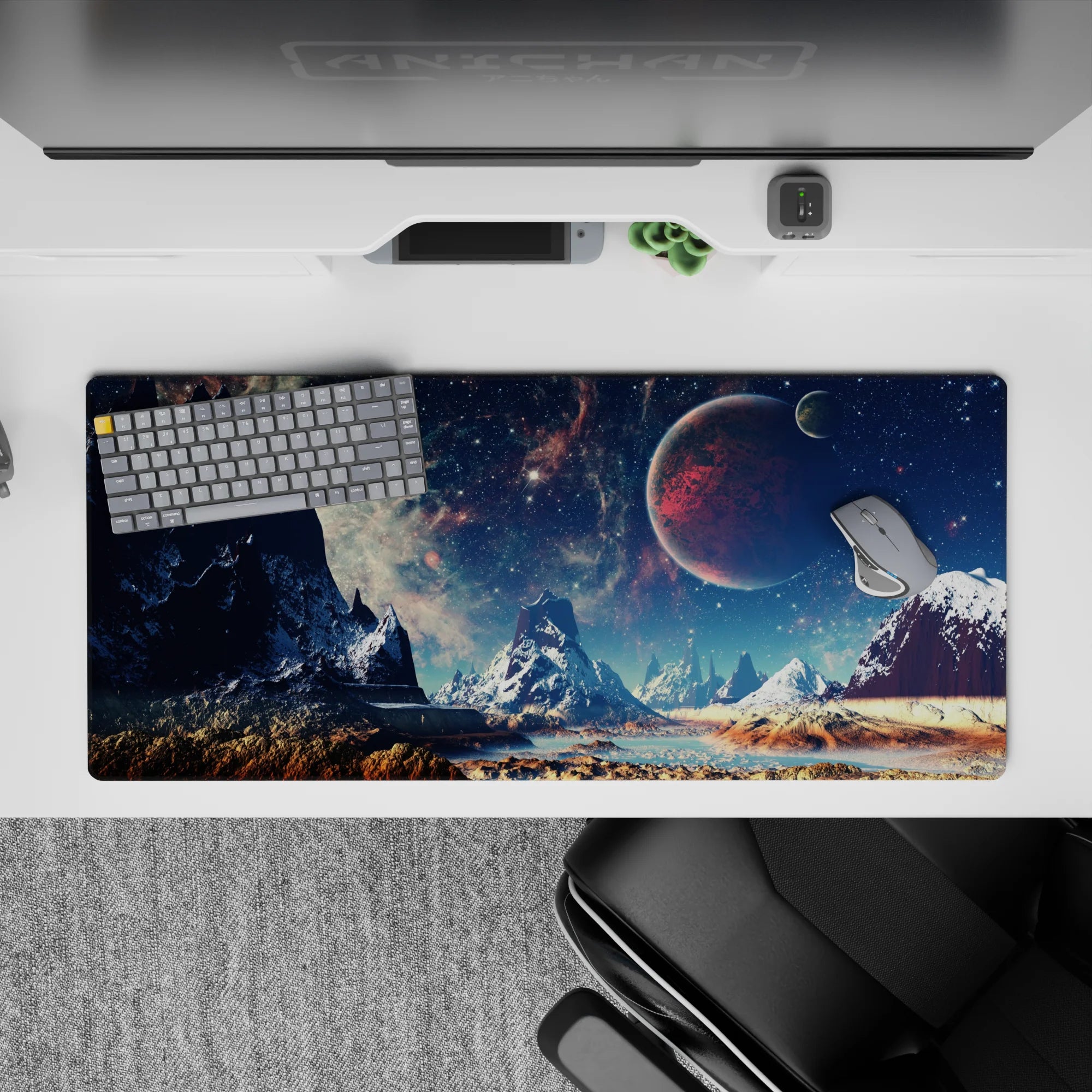 Moody teal and midnight tones desk pad 36x16 inches with starlit sky, frosty peaks, and warm sand.