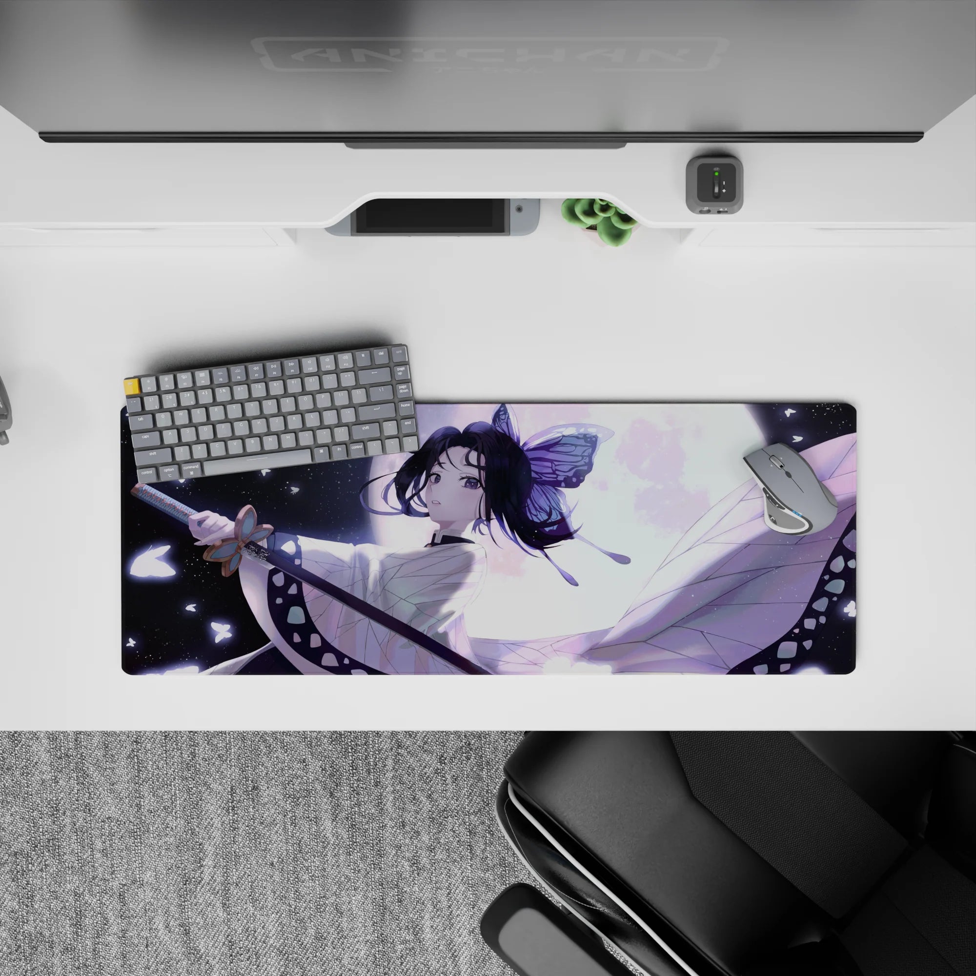 Shinobu Kocho from Demon Slayer on a 32x12 inch anime mouse pad, showcasing her elegance and strength under moonlight.