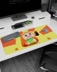 Chibi anime girl in hamster hoodie holding soda and chips on desk pad 36x16 inches, rosy cheeks.