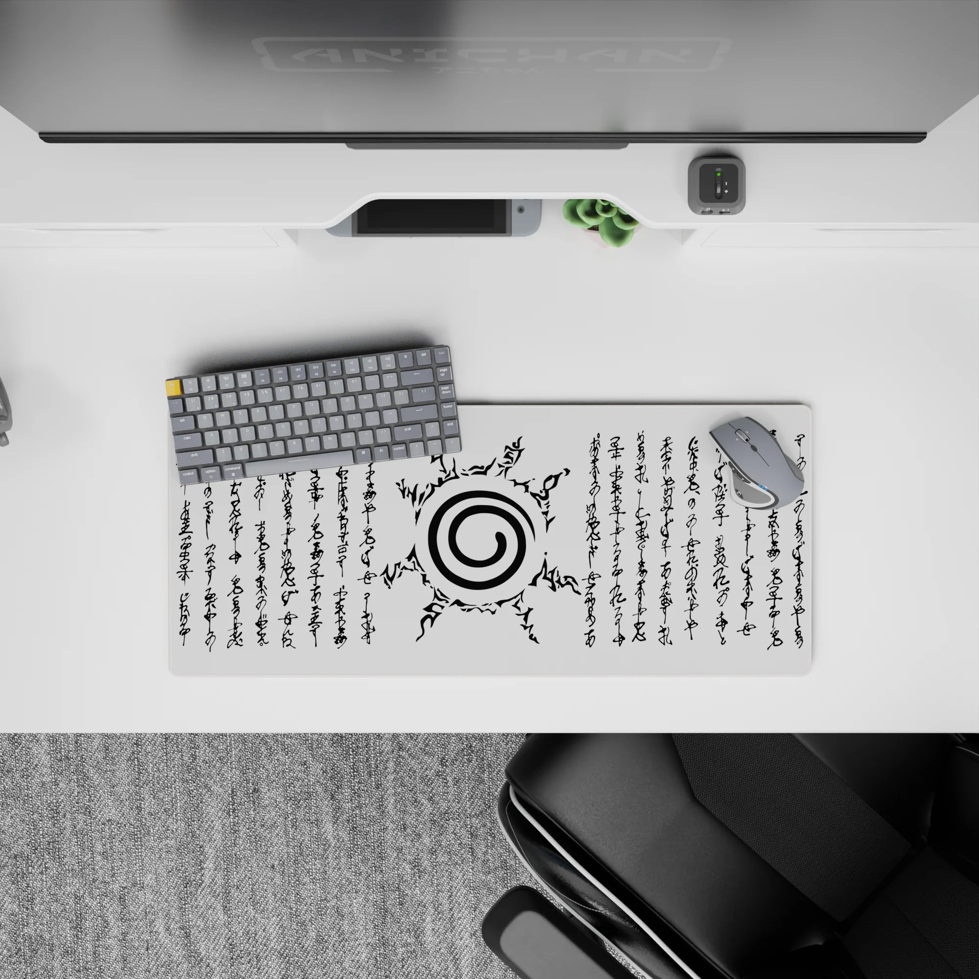 Anime mouse pad 28x12 inches featuring Naruto&#39;s Uzumaki clan symbol with sealing script, black ink on white background.