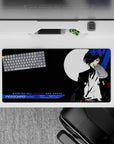 Persona 3 anime mouse pad 32x16 inches featuring protagonist with blue hair and black suit, set against a moody backdrop.