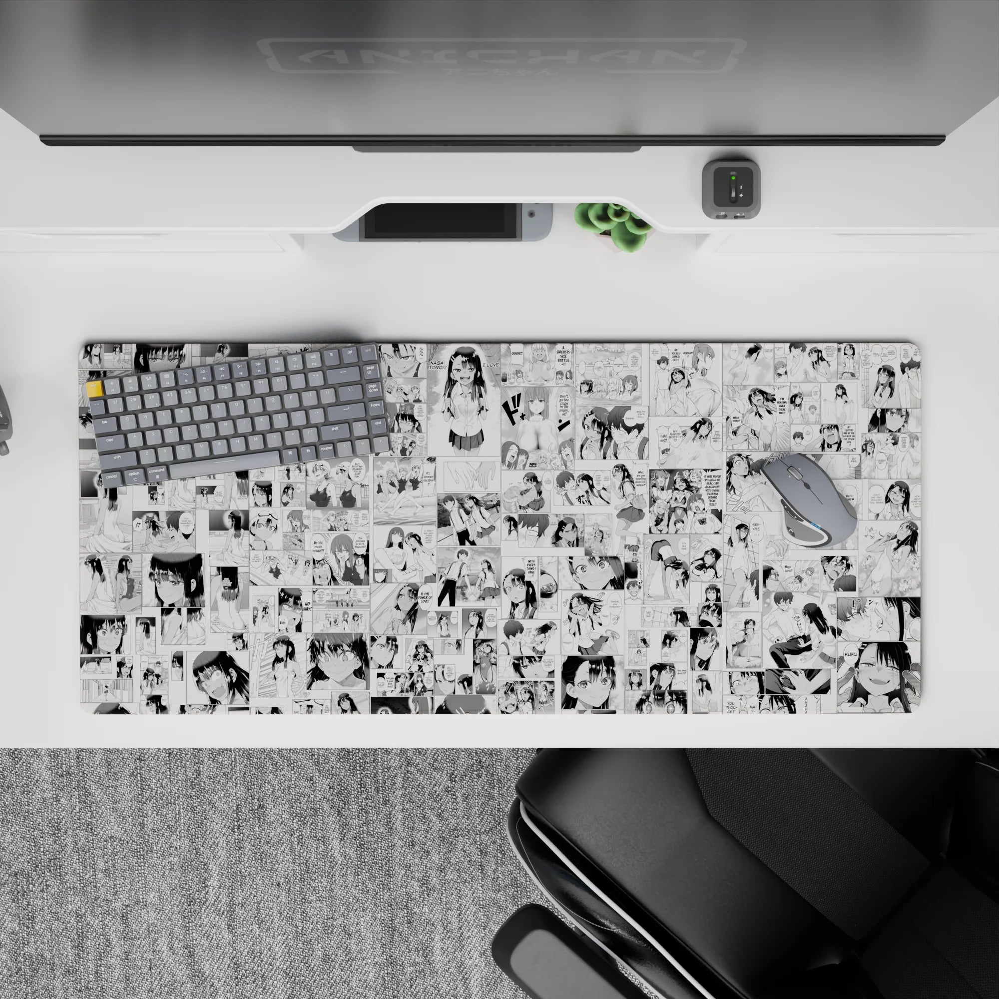 36x16 inches black-and-white anime desk pad with crisp ink linework and playful, blushy comic mood.