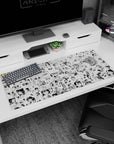 36x16 inches anime girl desk pad featuring wide-eyed schoolgirls, ribbons, skirts, and cheeky reactions.