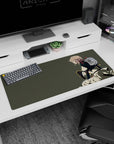 36x16 inches desk pad showing a crouching blonde anime heroine staring ahead, wind-swept cape flowing.