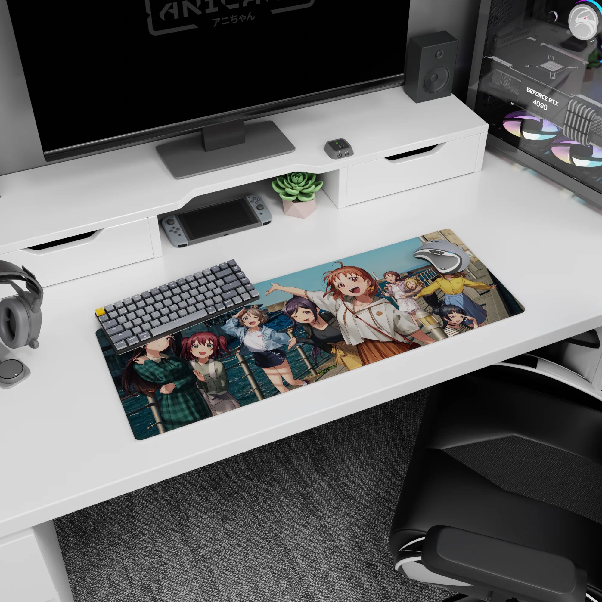 Anime girl mouse pad 32x12 inches showing a girl waving and another winking in a beach snapshot scene.