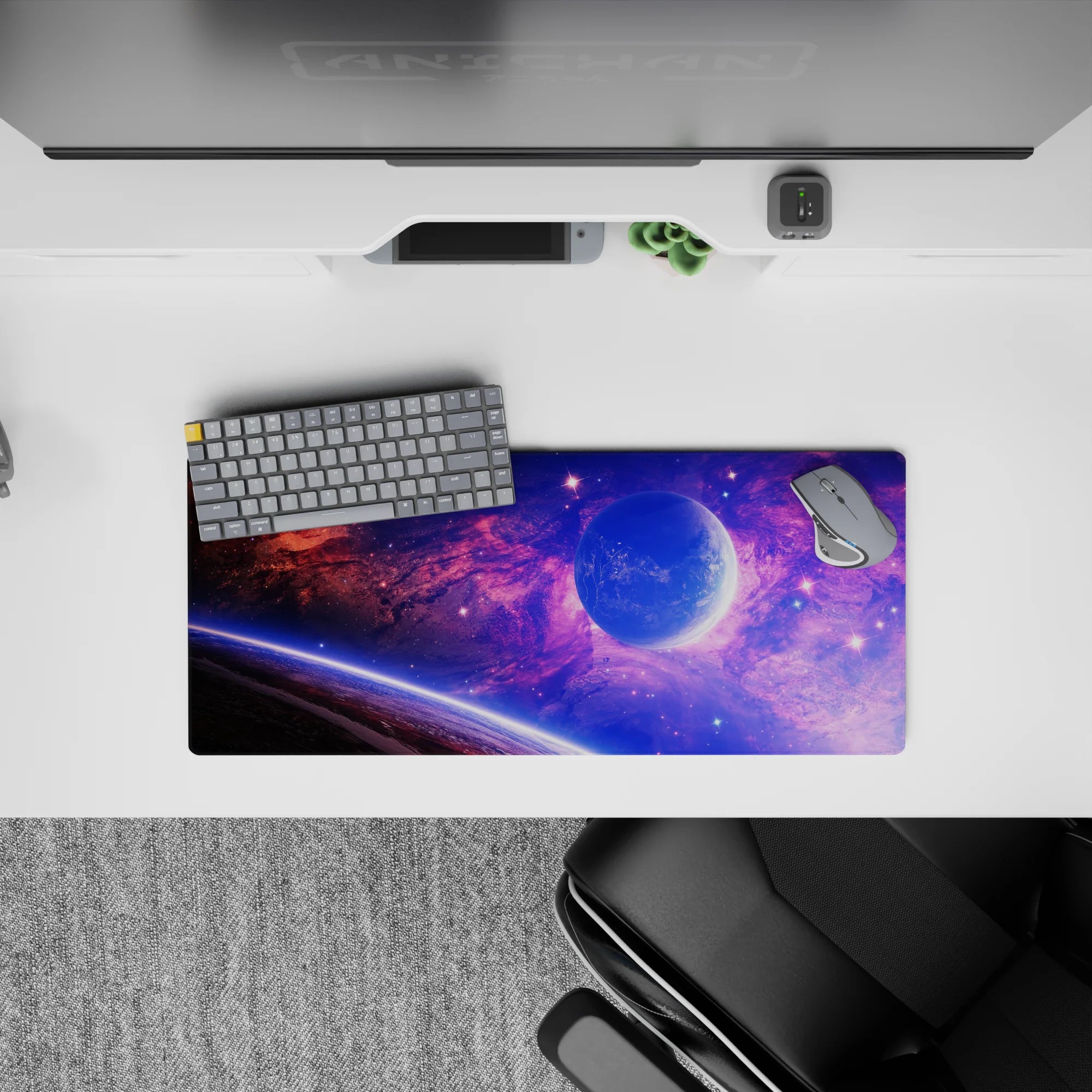 Galaxy-inspired mouse pad with violet, blue, and pink tones, size 28x12 inches, perfect for vibrant desk setups.