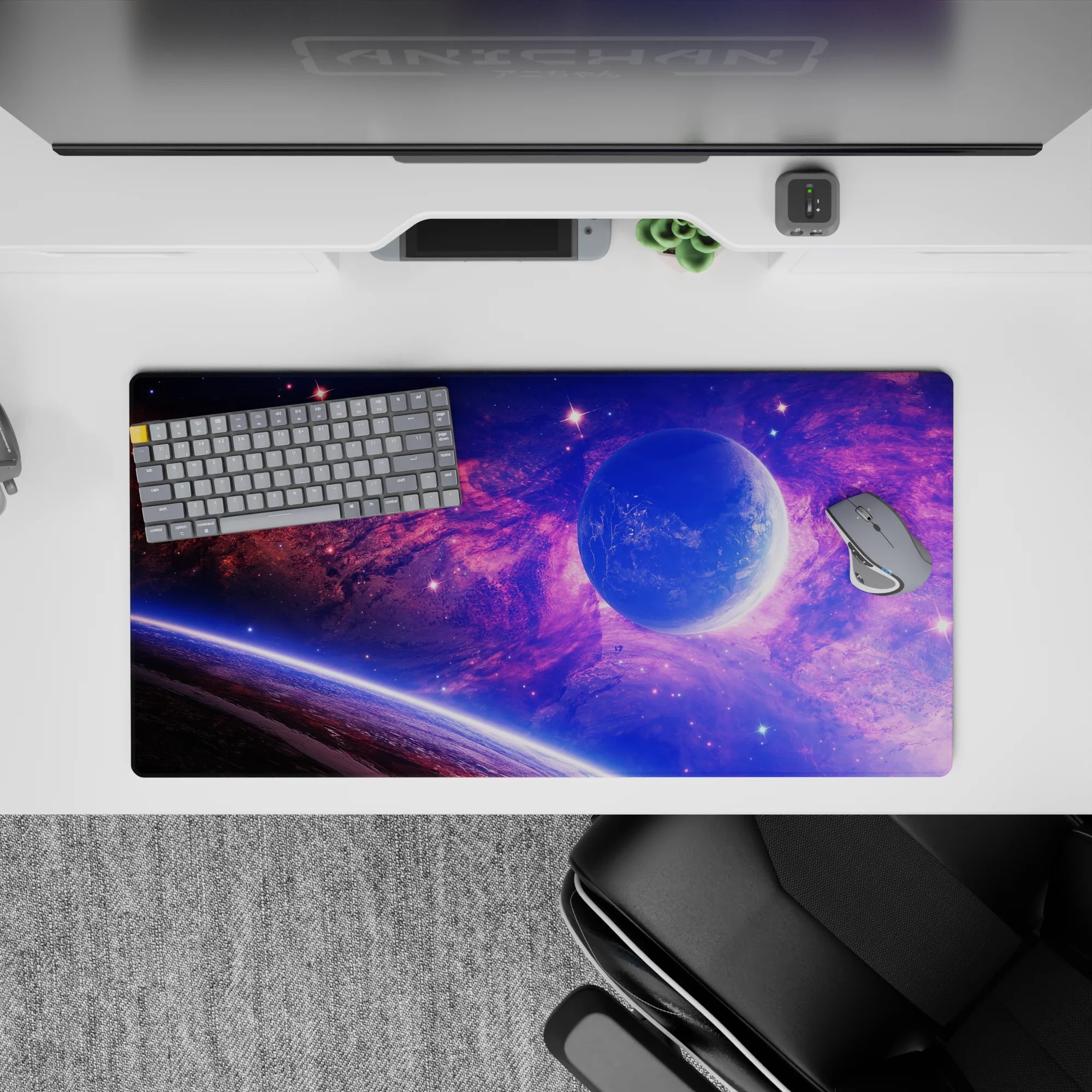 Galaxy-themed extended mouse pad 32x16 inches with purple and blue nebula design, smooth surface for desk setup.