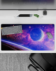 Galaxy-themed extended mouse pad 32x16 inches with purple and blue nebula design, smooth surface for desk setup.
