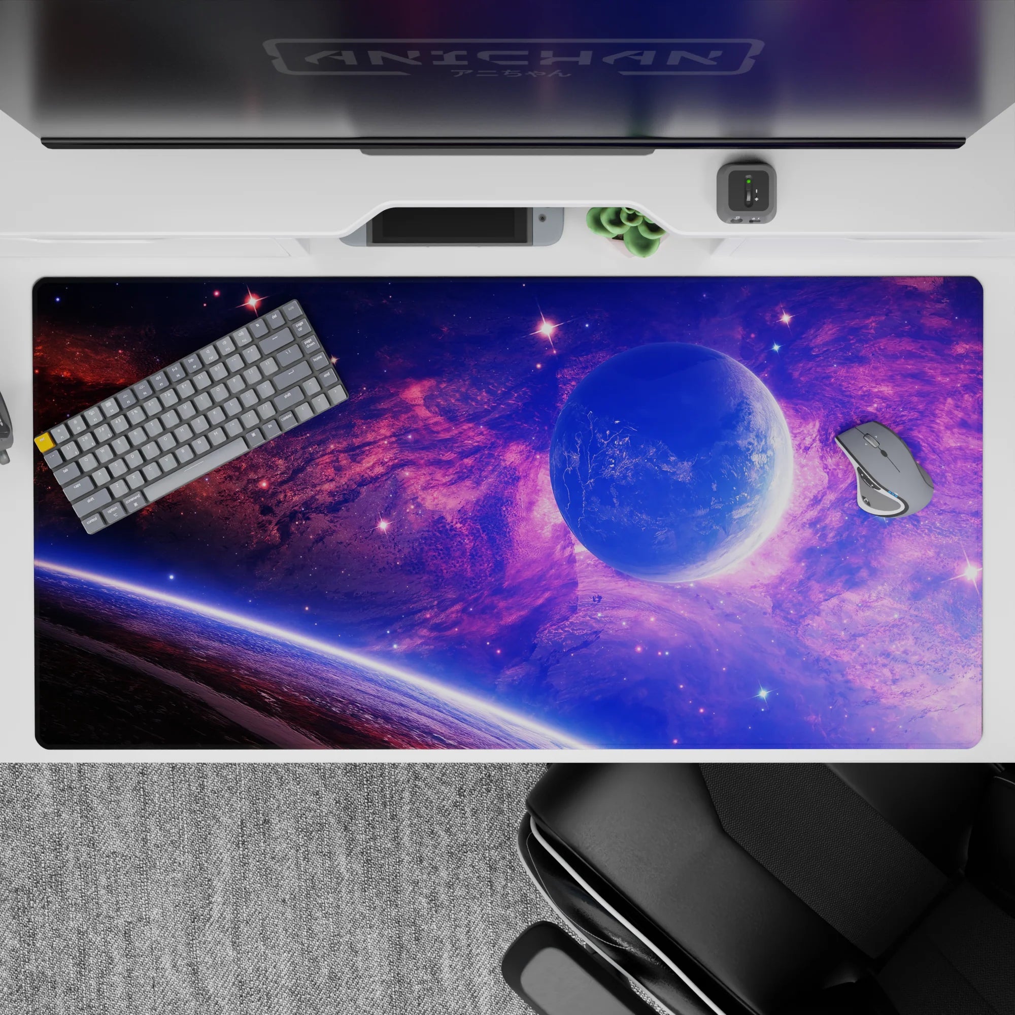 Galaxy-themed desk pad 40x20 inches featuring violet and blue clouds with stars, adding color to any workspace.