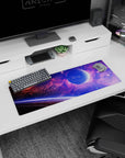 Galaxy-themed extended mouse pad 32x12 inches with violet and blue clouds, stars, and a glowing horizon.