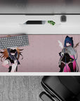 Moody pastel anime desk pad 36x16 inches in blush pink with midnight blue hair, pink streak, fleur accents.