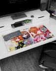 32x16 inches anime girl mouse pad showing pink-haired girl with blossoms beside bunny-ear orange bob under sakura.