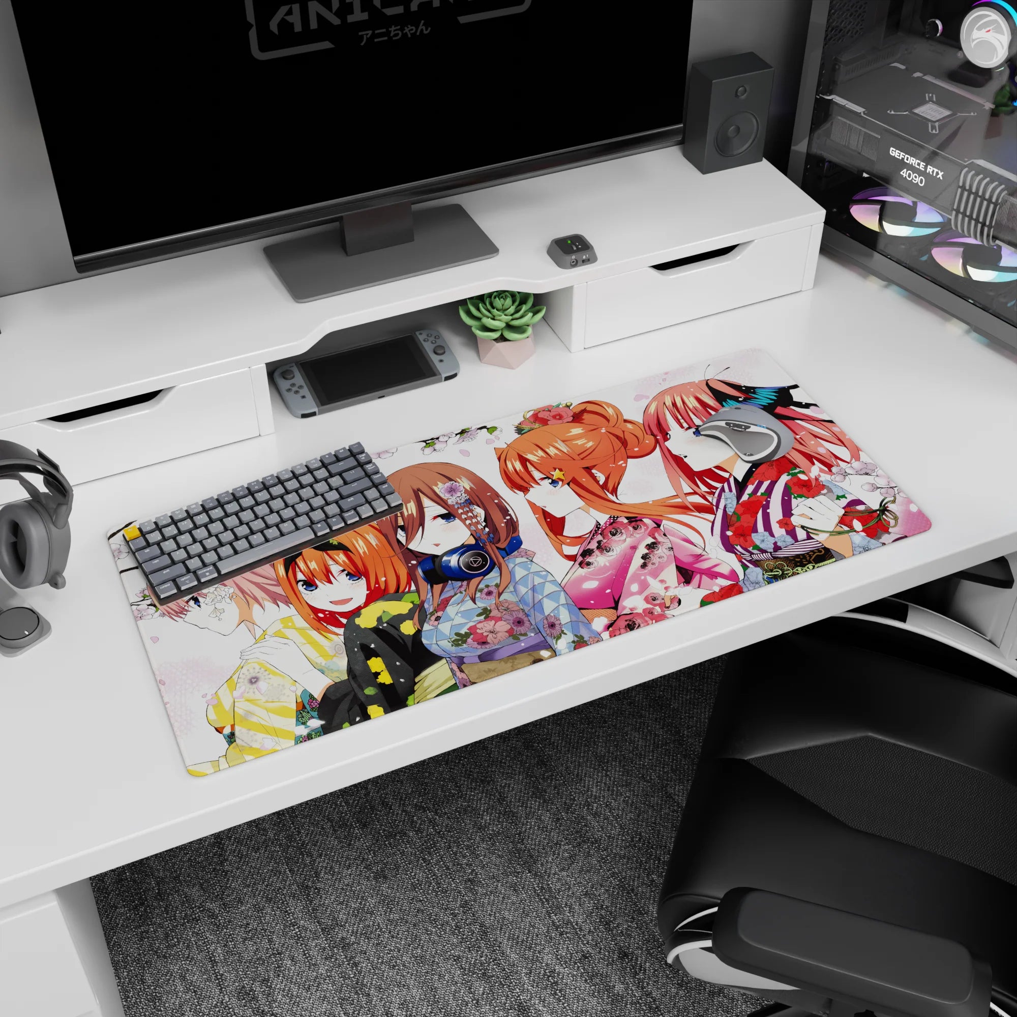 36x16 inches anime girl desk pad showing pink-haired blossom girl beside bunny-ear orange bob under sakura.