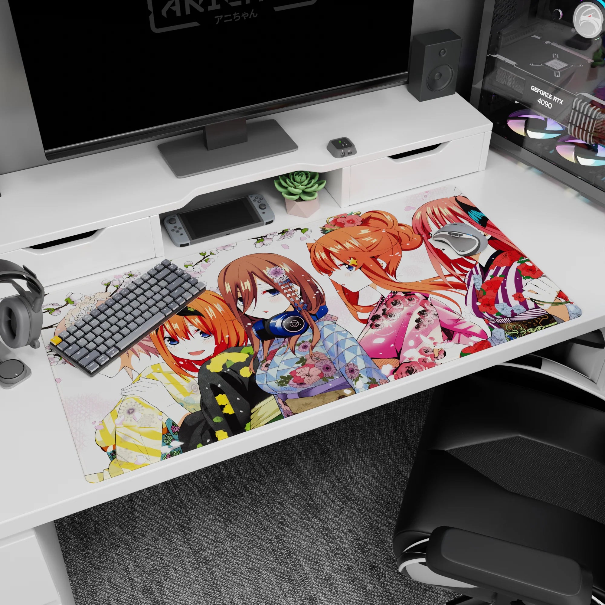 Anime desk pad 40x20 inches featuring pink-haired girl with blossoms beside bunny-ear orange bob in yukata.