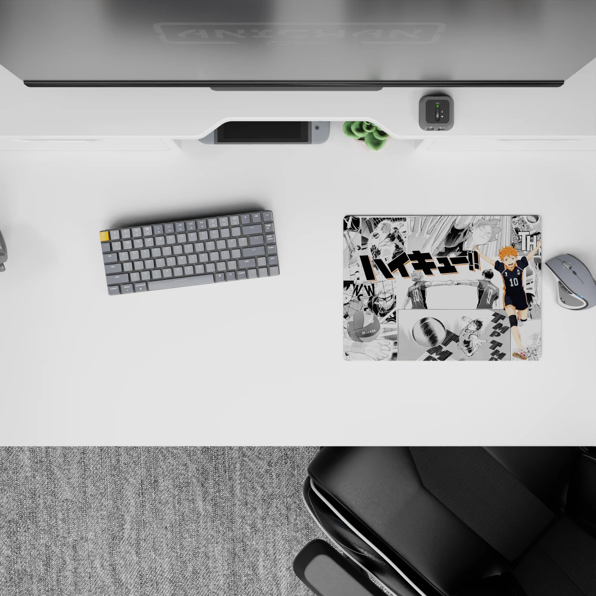 Black-and-white manga panels with bright orange Hinata on anime mouse pad 14x10 inches, energetic vibe.