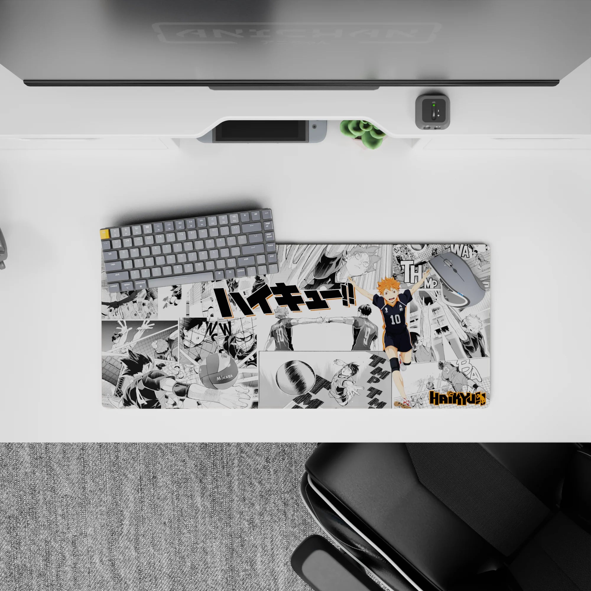 High-energy orange-on-mono anime mouse pad with bold print and smooth tracking vibe, 28x12 inches.