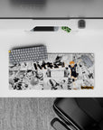 High-energy orange-on-mono anime mouse pad with bold print and smooth tracking vibe, 28x12 inches.