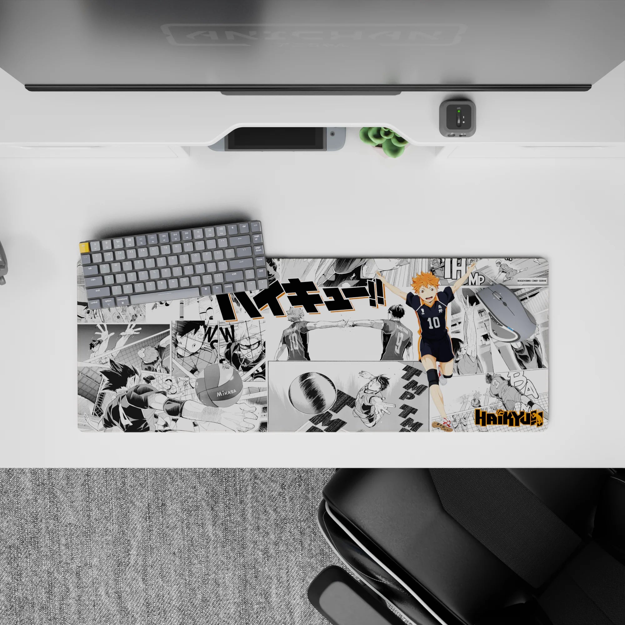 Fast, high-energy orange-on-monochrome anime mouse pad 32x12 inches with bold print and smooth tracking.